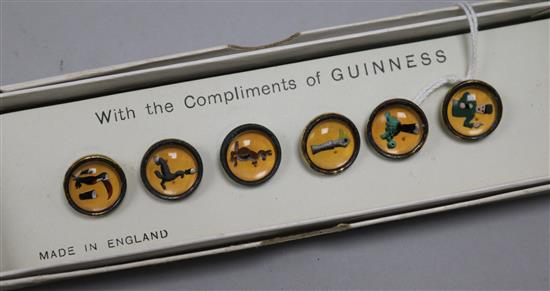 A boxed set of six Guinness buttons